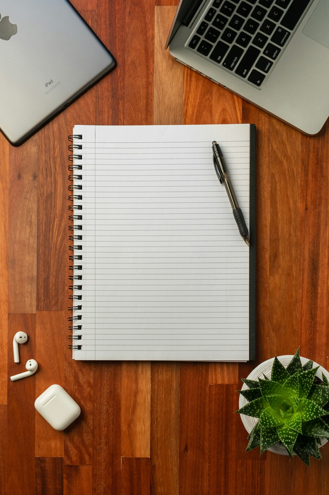 mystery writer at desk with notebook